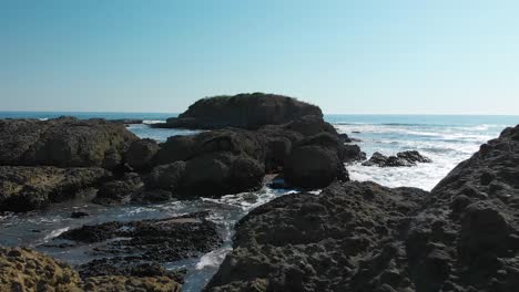 Drone-Flying-Between-Sea-Rocks-Towards-Bulgarian-Black-Sea-Coast-In-Lozenets,-Burgas,-Bulgaria