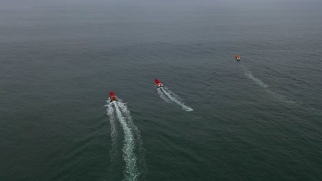 fishing boat going fishing on a day of swells on the coast of chile bucalemu recording of a drone