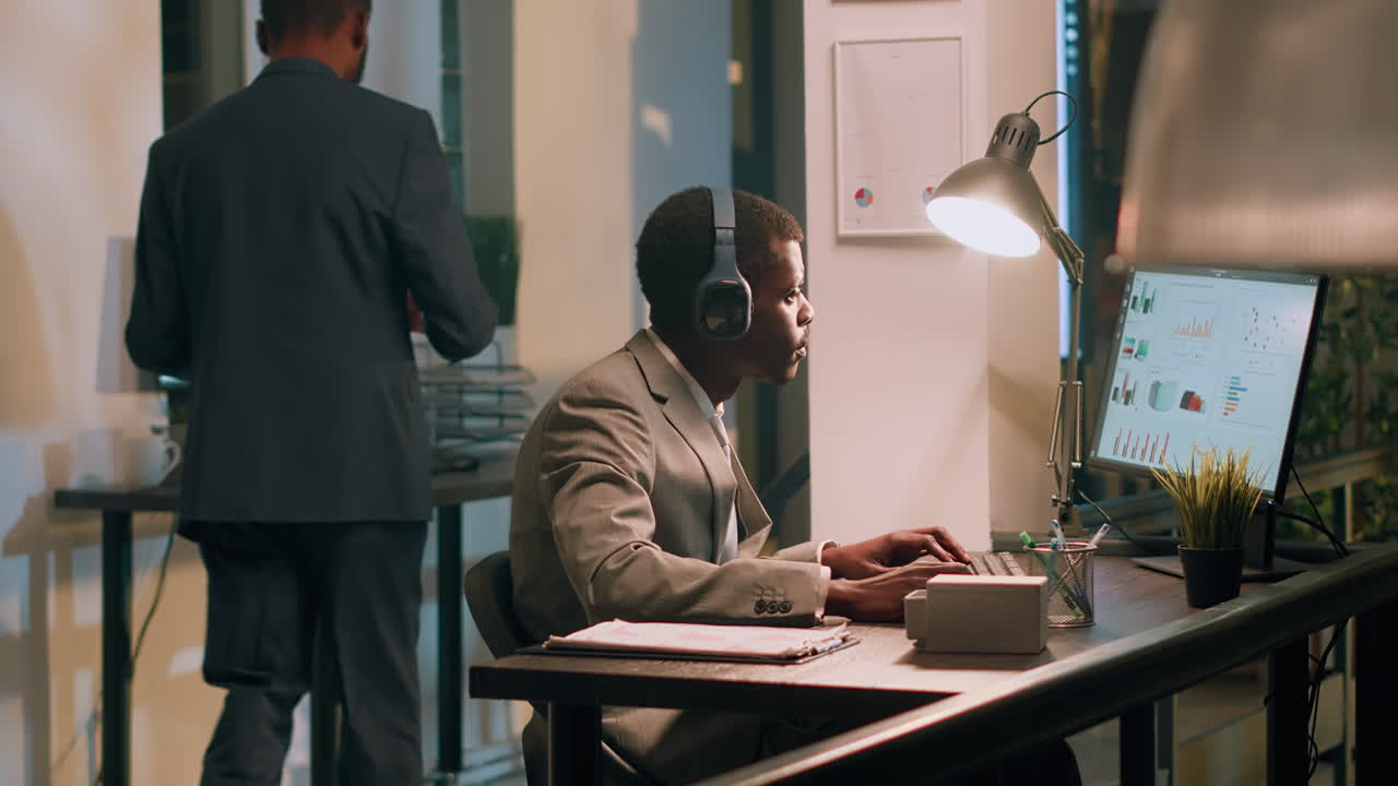 Man working on computer in office