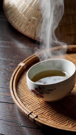 hot tea in a traditional asian cup