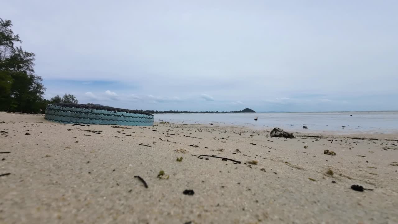 Time-lapse sequence at Lamai Beach, Koh Samui, Thailand, capturing the sandy coastline, turquoise ocean, and fast-moving clouds in a tropical seascape