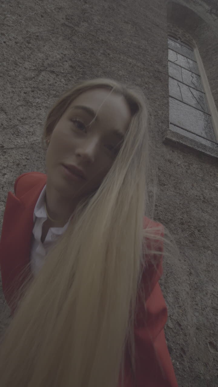 Stylish Woman in Red Suit