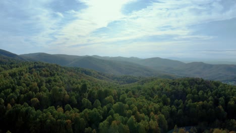 rolling hills and clouds at shenandoah national park, virginia - aerial drone shot