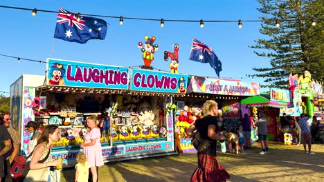 people enjoying games at a lively carnival