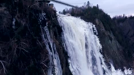 huge waterfall filmed in drone during autumn in quebec, canada