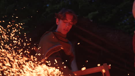medieval craftsman demonstrating metalworking