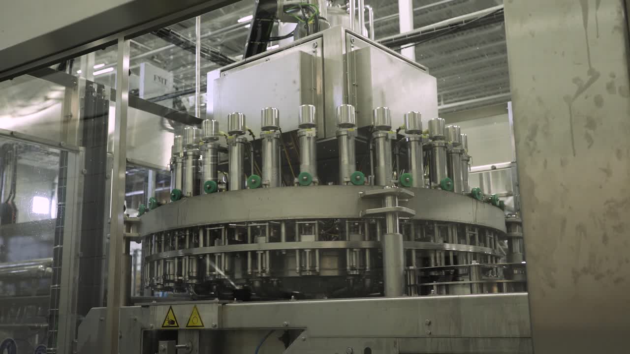 Large spinning machinery at packaging factory, WIDE