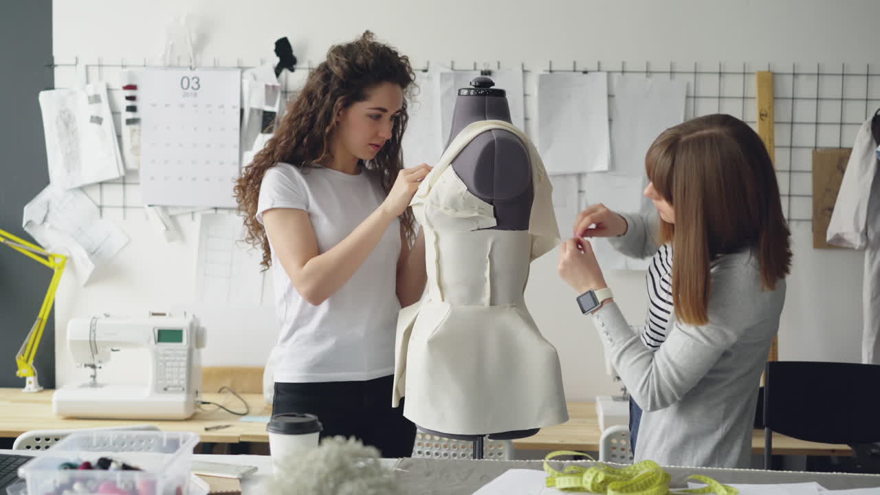 Two Fashion Designers Working on a Dress Prototype