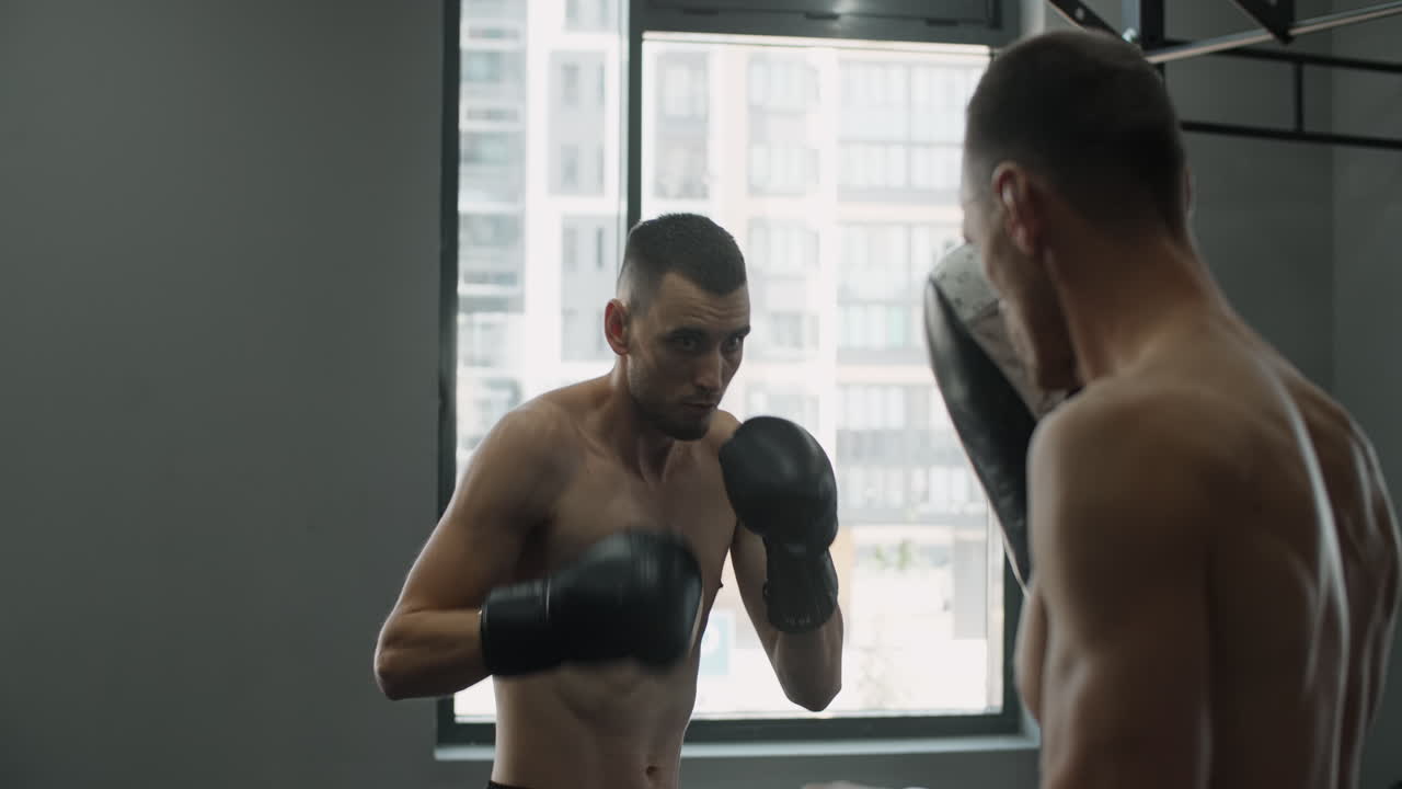 Boxing and Kickboxing Training Session in Gym