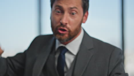annoyed manager arguing online call in office closeup. stressed man discussing