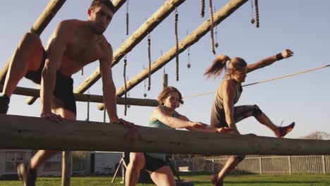 young adults training at an outdoor gym bootcamp