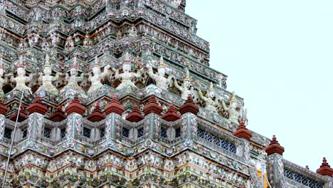 intricate mosaics of wat arun temple spire