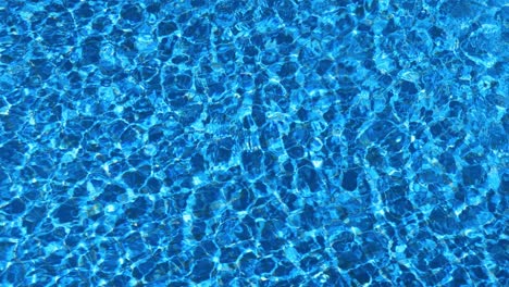 background of water in a swimming pool