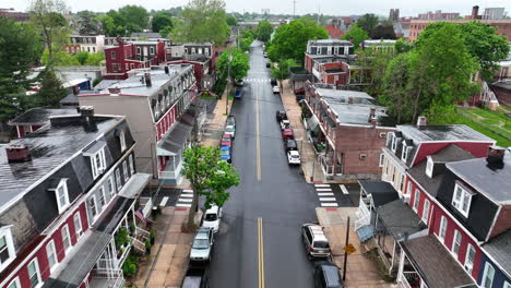 Aerial-flight-down-city-street