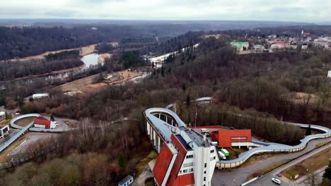 Aerial-view-of-The-Sigulda-Bobsleigh-and-Luge-Track-located-in-Sigulda,-Latvia-for-International-competitions