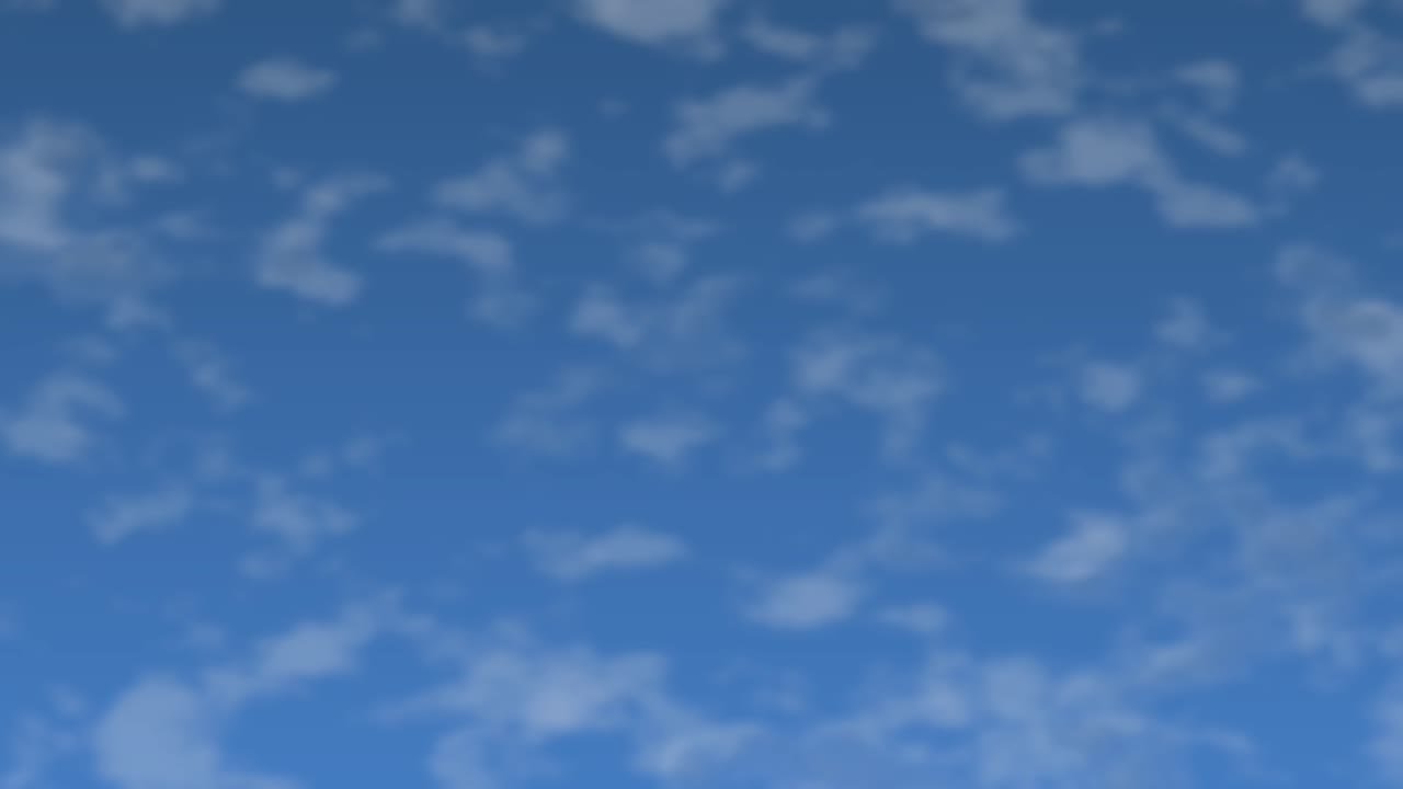 Nuvole bianche e leggere fluttuano lentamente in un cielo blu brillante in un ciclo organico e calmo