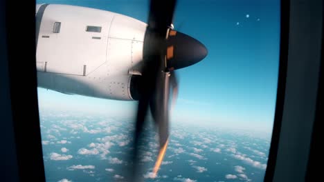 Rotating-propeller-of-light-aircraft-in-flight-at-altitude-above-the-clouds