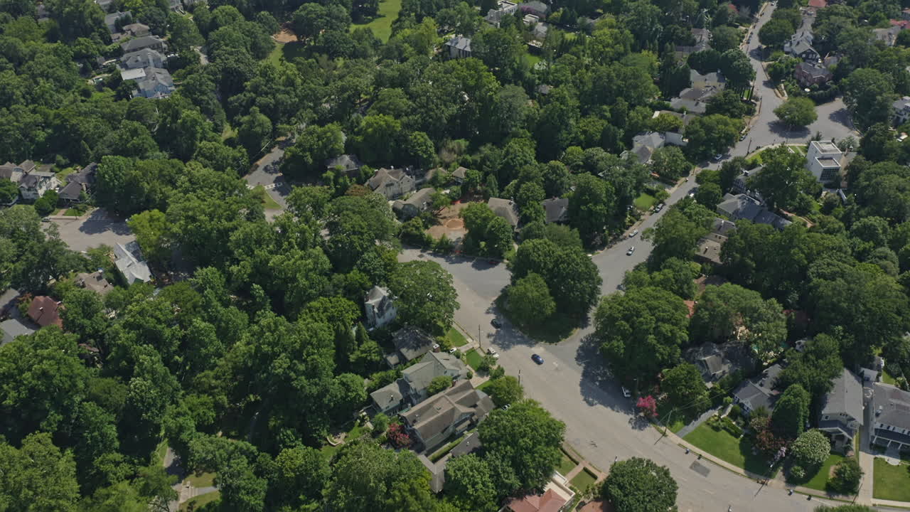Atlanta Georgia Aerial v613 tilt up shot of Ansley Park neighborhood and skyscrapers in midtown - July 2020