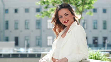 stylish woman in a white blazer