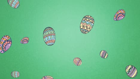 Animation-of-easter-eggs-falling-on-green-background