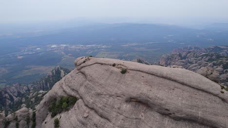 mountain top in montserrat national park, aerial reveal