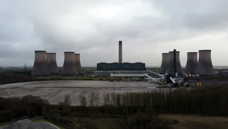 aerial view over coal fired power station site, fiddlers ferry overcast smokestack skyline
