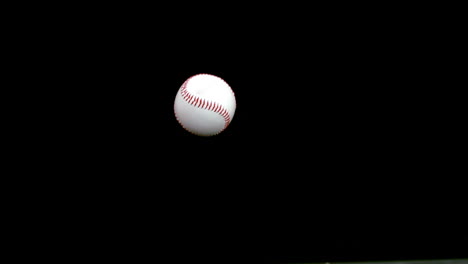 baseball falling on the floor