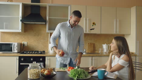couple preparing a healthy meal in the kitchen