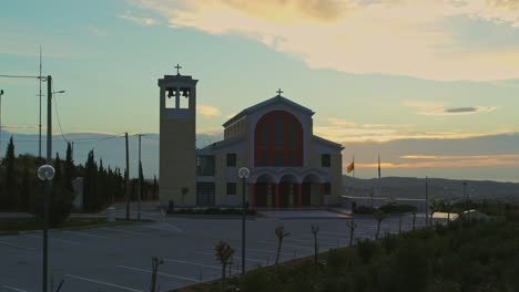 Aerial---Orthodox-Church-at-sunrise-in-Pallini,-Athens,-Greece