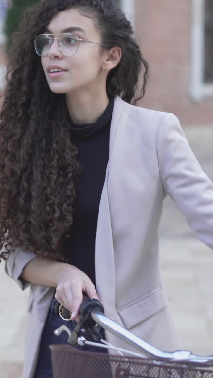 Woman Riding a Bicycle in the City
