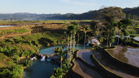 picturesque nature of weekacura waterfalls with terraced fields in west sumba, indonesia