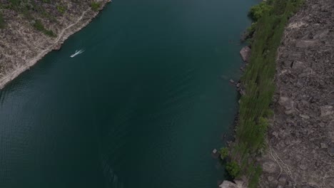 beautiful scenery view of lake upper kachura in pakistan with lush green trees and blue and green lake water