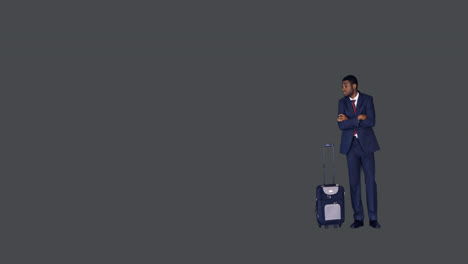 businessman standing with arms crossed with his luggage