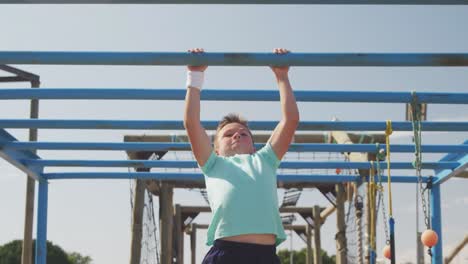 Caucasian-boy-training-at-boot-camp-