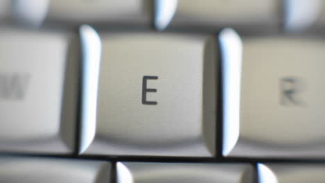 the letter e on a keyboard comes into focus