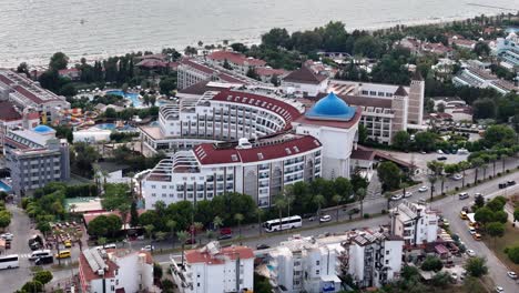 Hotel-for-Tourists-in-Downtown-City-of-Side,-Turkey,-Aerial-Drone-View