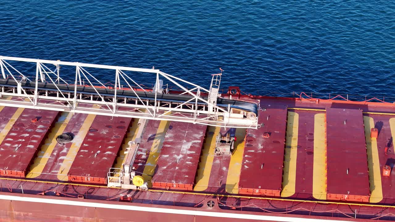 Aerial close-up of bulk carrier cargo holds on Detroit River