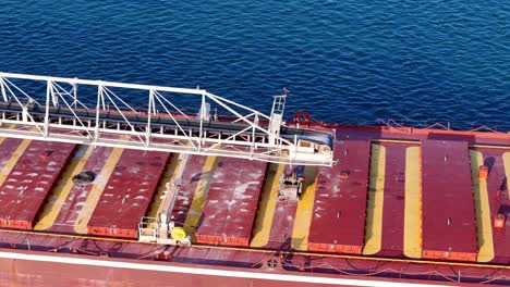 aerial close-up of bulk carrier cargo holds on detroit river