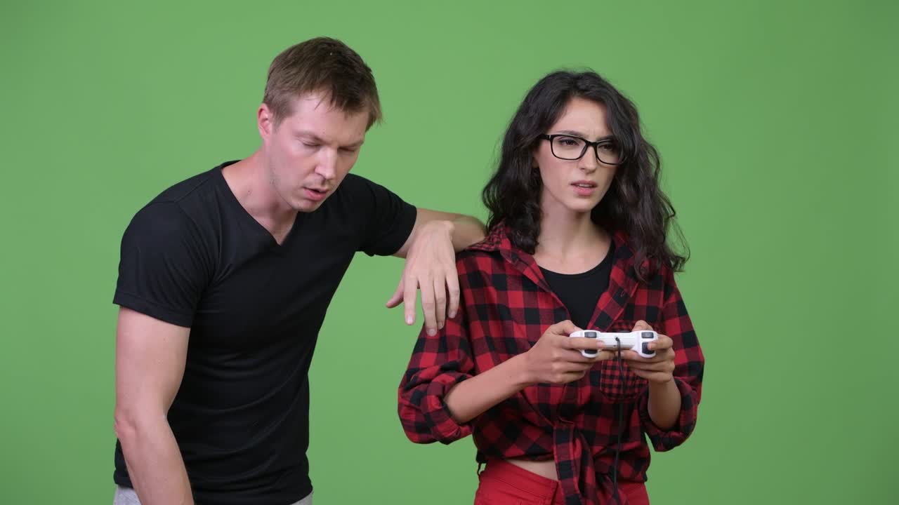 Young couple playing games together