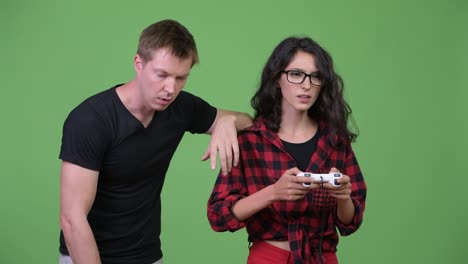 young couple playing games together