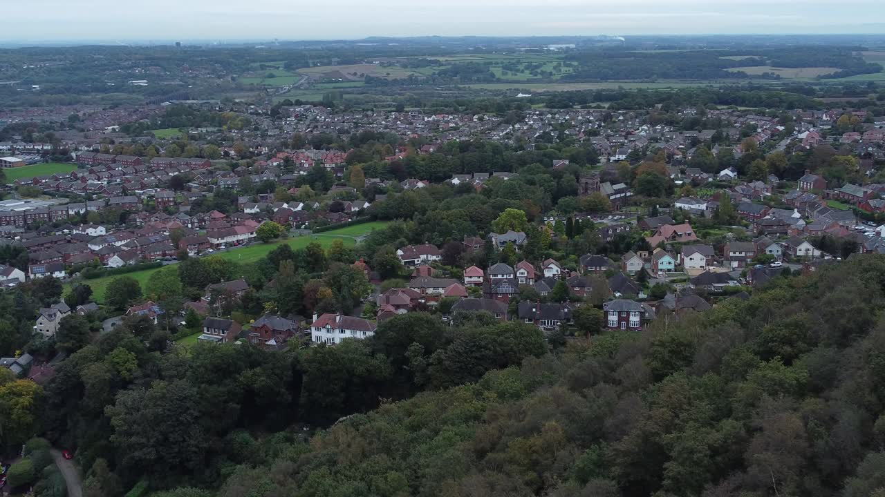Aerial view above Halton North England coastal countryside town estate green space