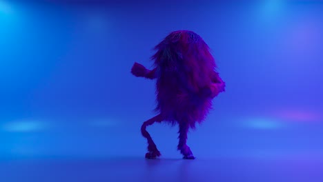 cheerful colorful hairy cartoon dancing character, furry animal, having fun, furry mascot animation. modern minimalist design. flashing neon club light. 3d animation of seamless loop.
