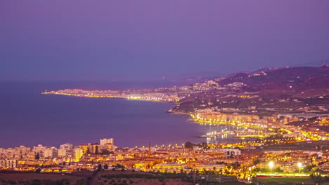 Sunrise-over-majestic-coastal-city,-panoramic-time-lapse-view