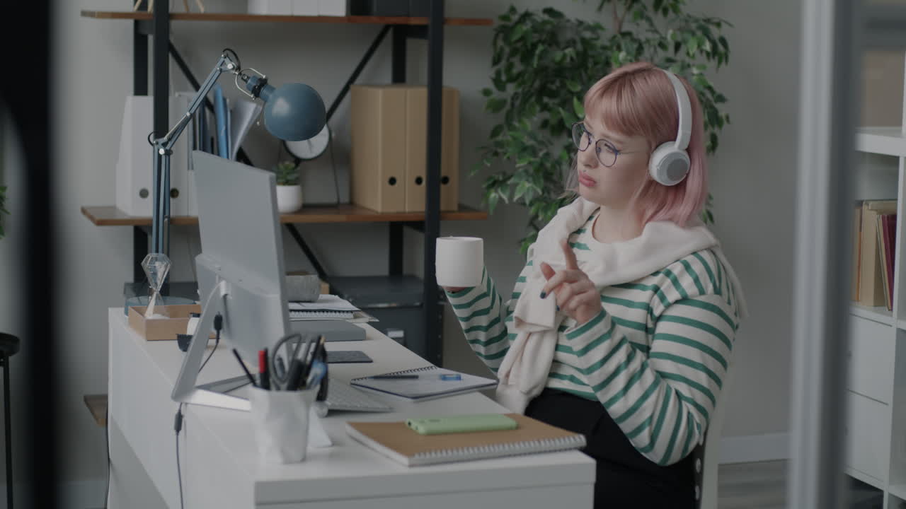 Woman in a home office on a video call