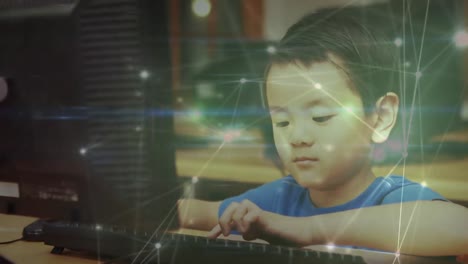 Animation-Von-Verbindungsnetzwerken-über-Einen-Asiatischen-Jungen,-Der-Einen-Computer-Benutzt