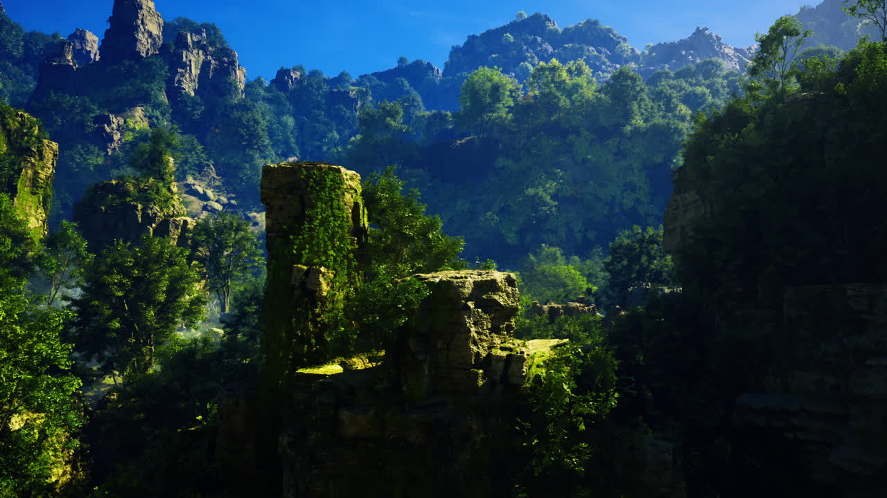 Majestic rocky formations rise amid vibrant greenery under a bright blue sky