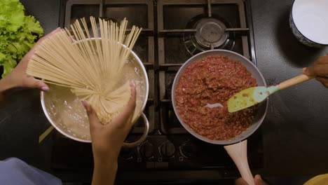 people cooking in the kitchen