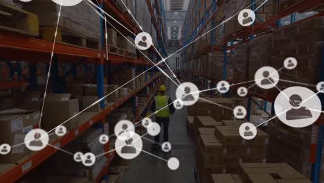 animation of network of connections over caucasian worker in warehouse