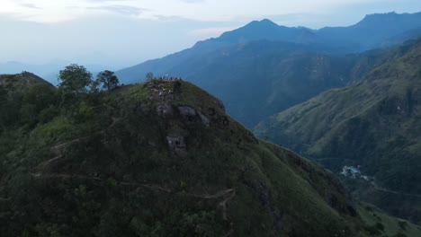 Aerial-drone-high-angle-shot-over-Little-Adam's-Peak-hill--the-popular-destination-in-Ella-town,-Sri-Lanka