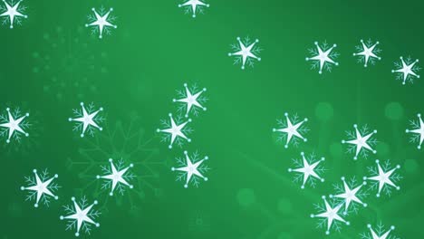 Animation-of-snowflakes-moving-on-green-background